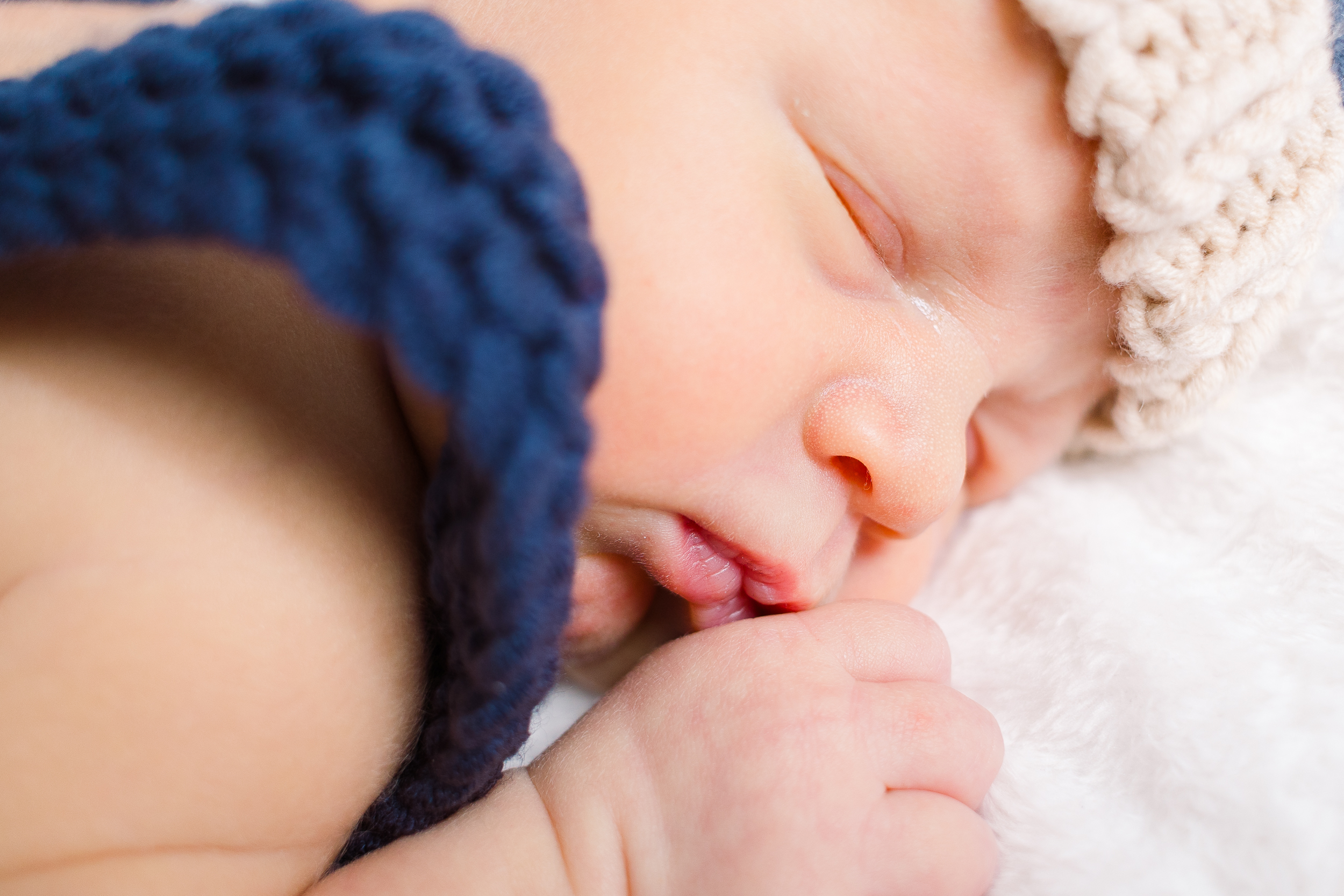 Baby boy sleeping during a lifestyle newborn session in Pittsburgh, PA