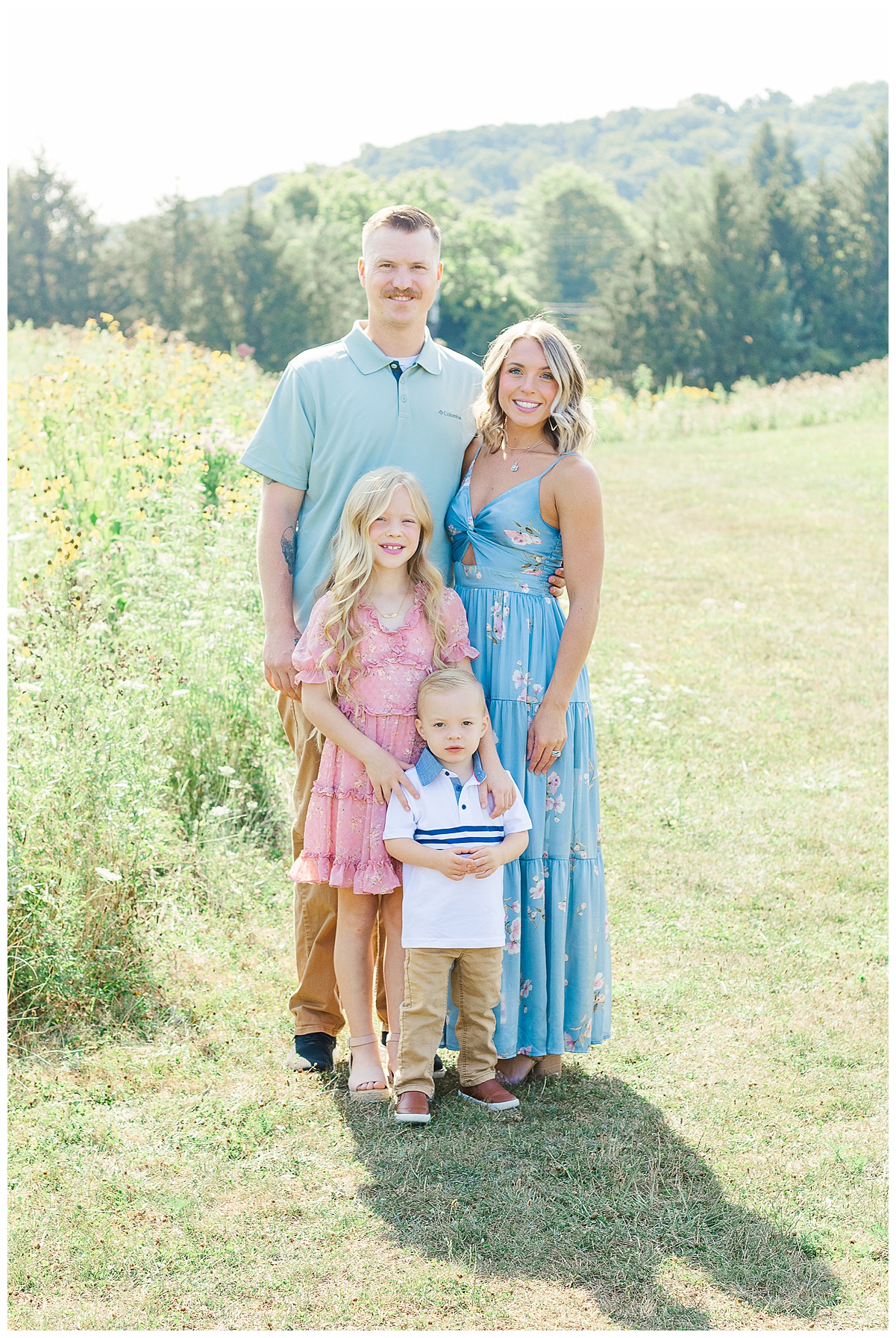 A family is posing for the 