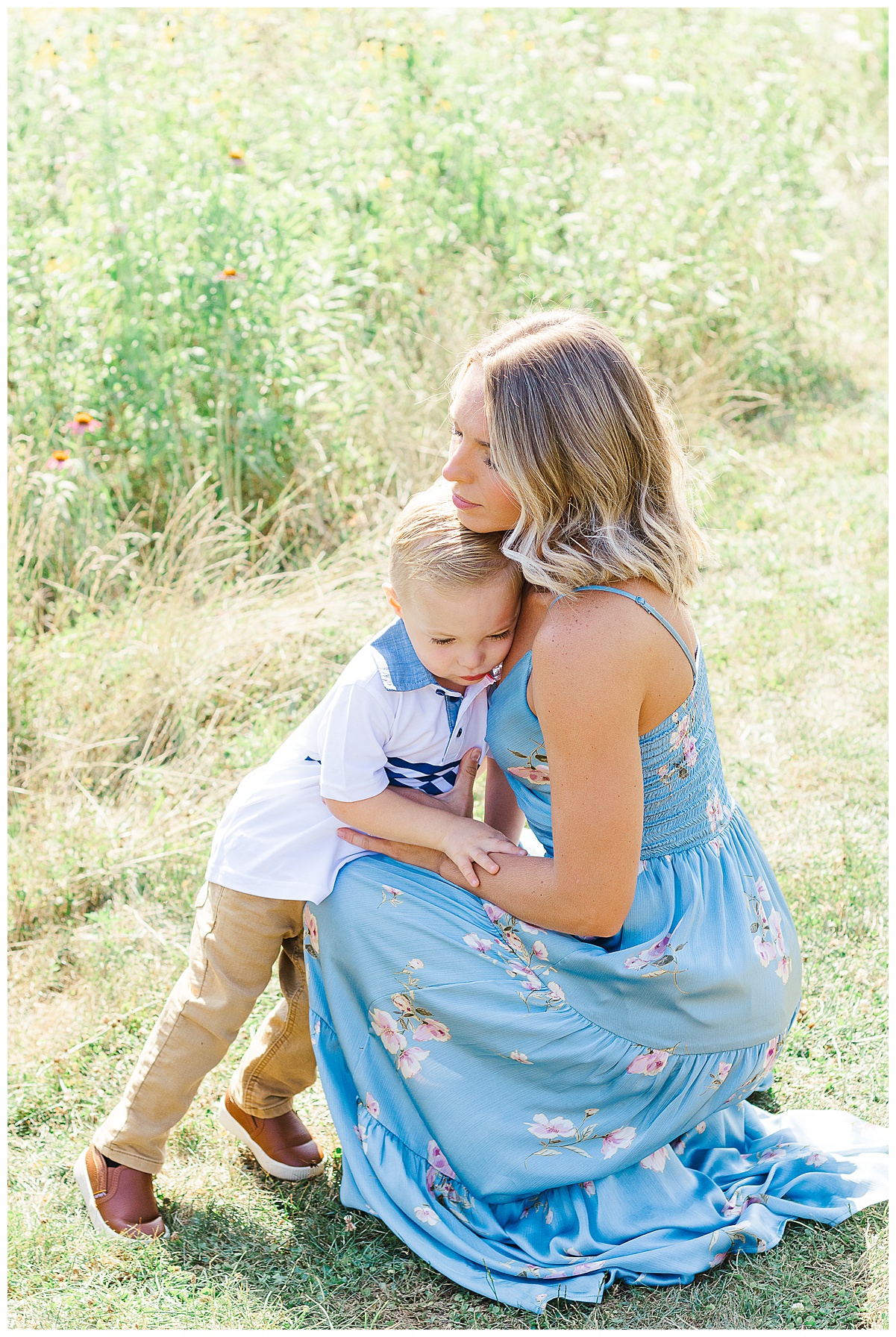 Mom and son are cuddling. This is an example of a candid moment. Captured by a Wexford Family Photographer