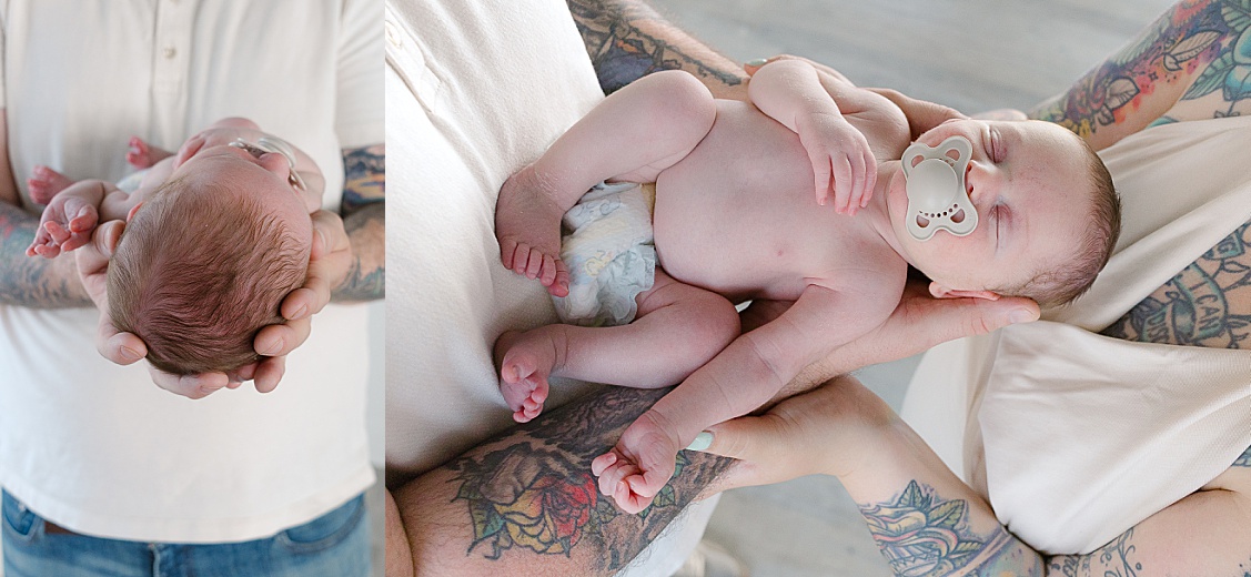 Mom and Dad are holding baby boy in their arms, this is taken in Wexford, PA during an In-Home Newborn Session.