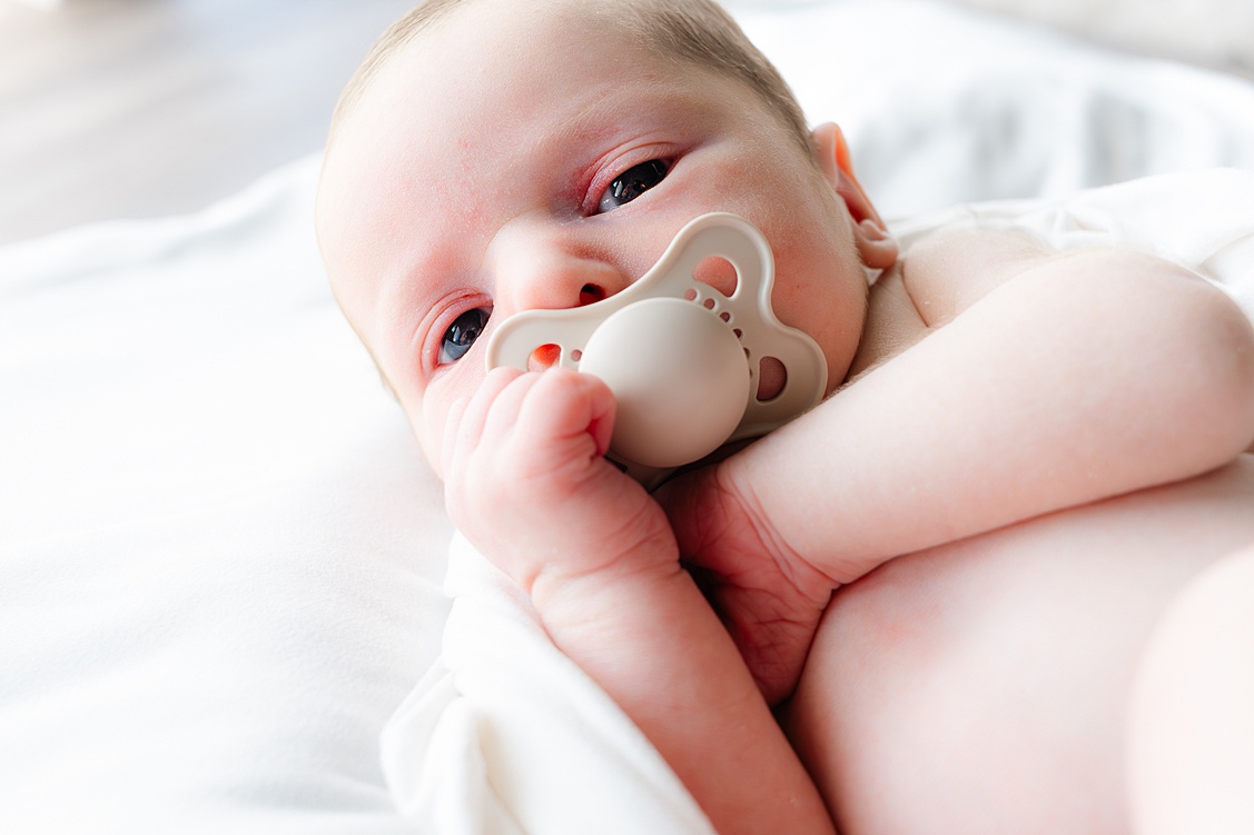 Picture of a baby boy during a newborn session. taken by a Wexford family photographer.