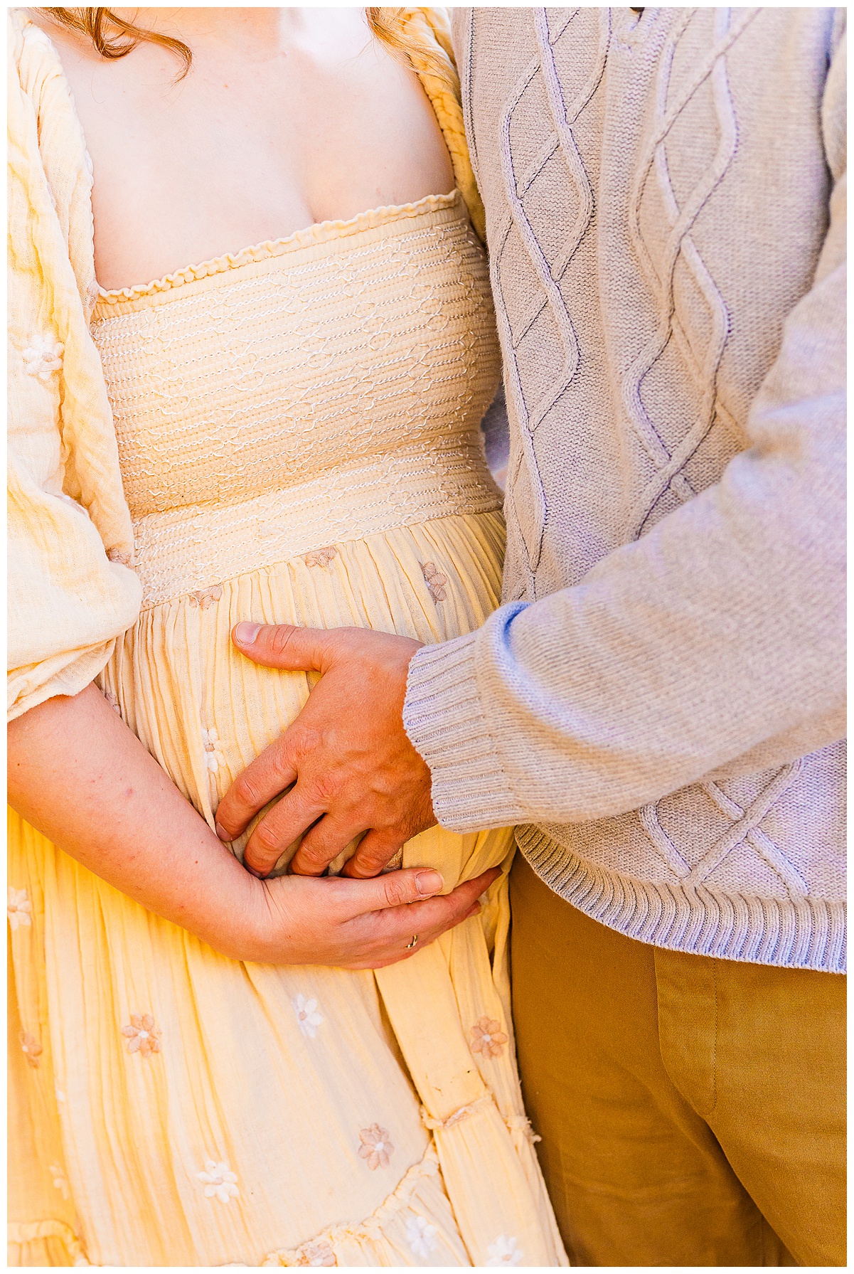 baby bump and dads hands. taken by a baby and pregnancy photographer in pittsburgh