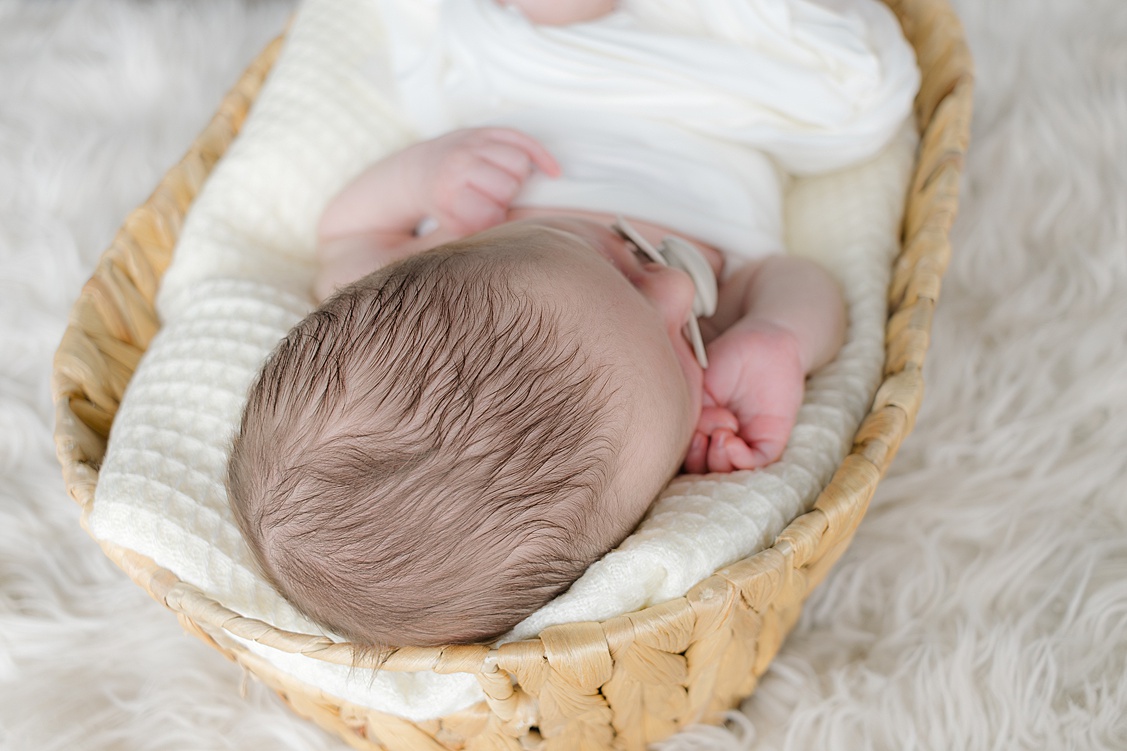 An image of all the hair that baby boy had during his newborn session in Hampton PA