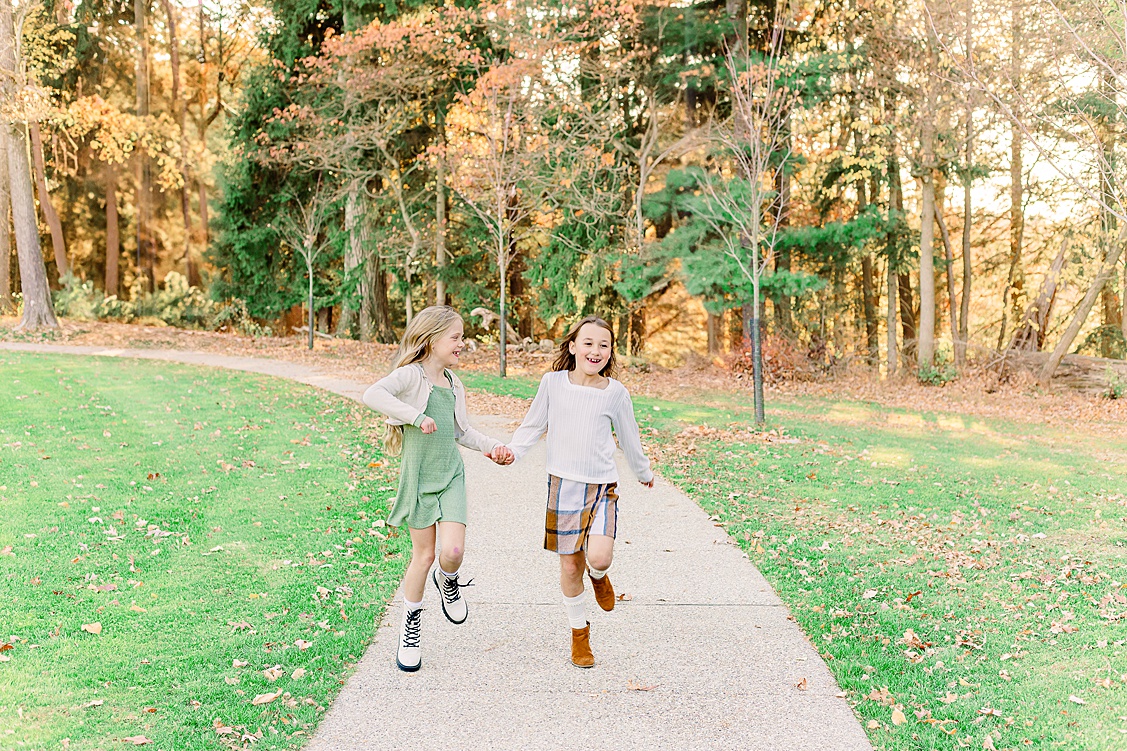 cousins running around having fun during the family session in Pittsburgh