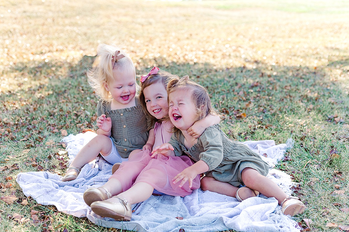 Sisters having a moment during a Pittsburgh holiday photo session