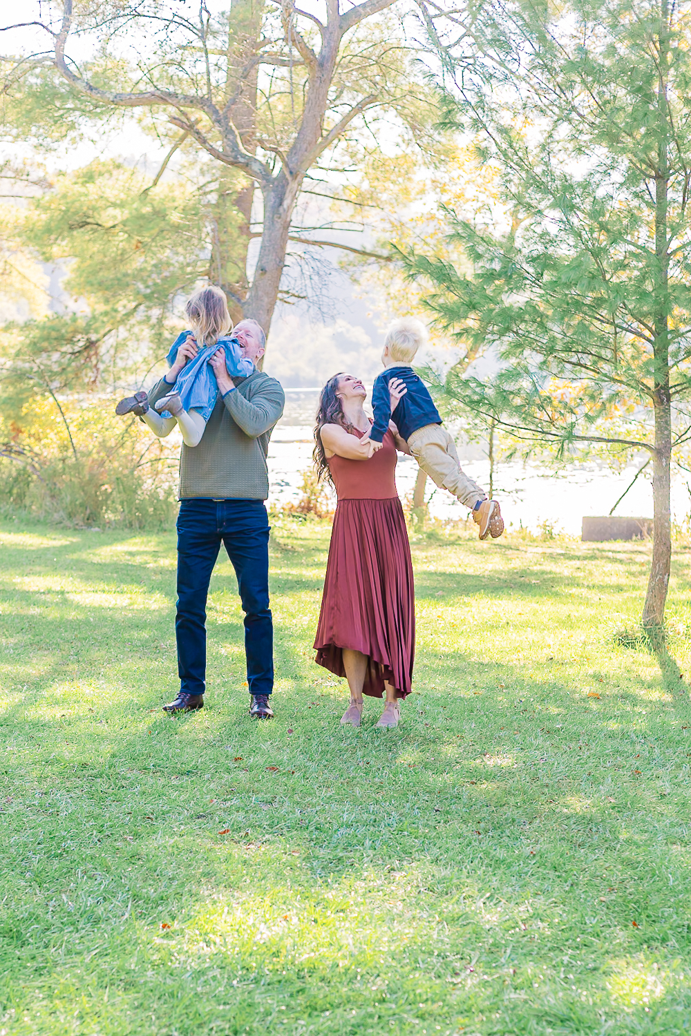 family having fun during their family photo session in pittsburgh. Part of the top 5 pittsburgh locations for family photos.