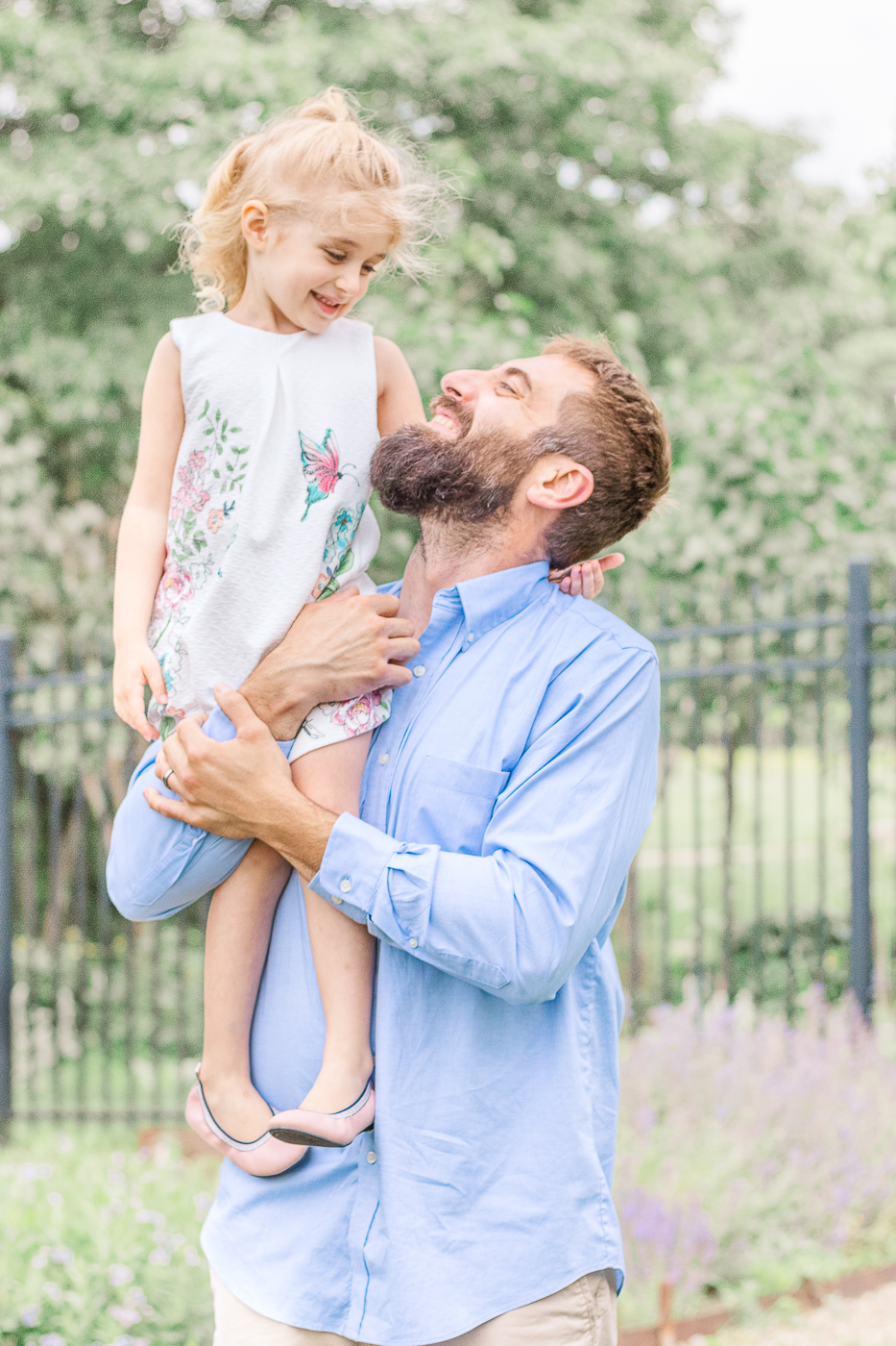 a sweet moment between dad and his school aged daughter.  Taken during a family photoshoot in Pittsburgh