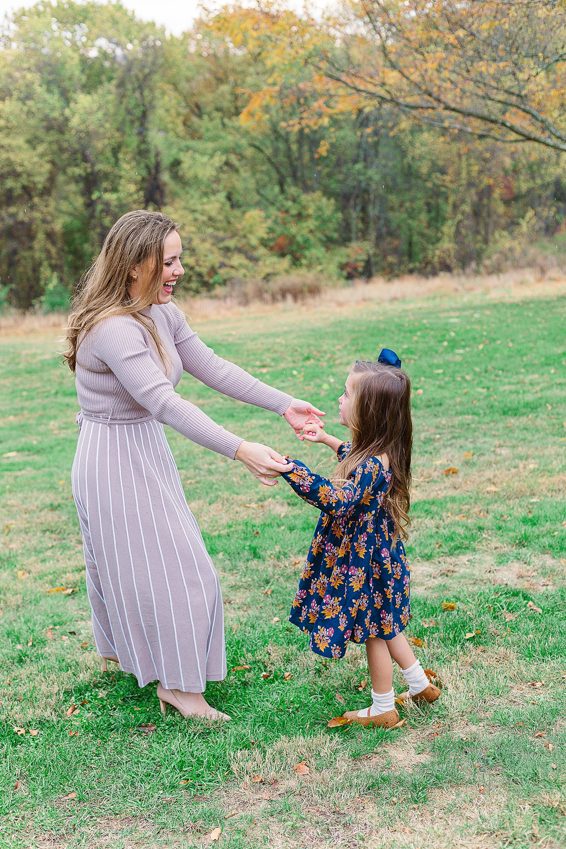 Mom dancing with daughter during a relaxes Wexford Family photography session