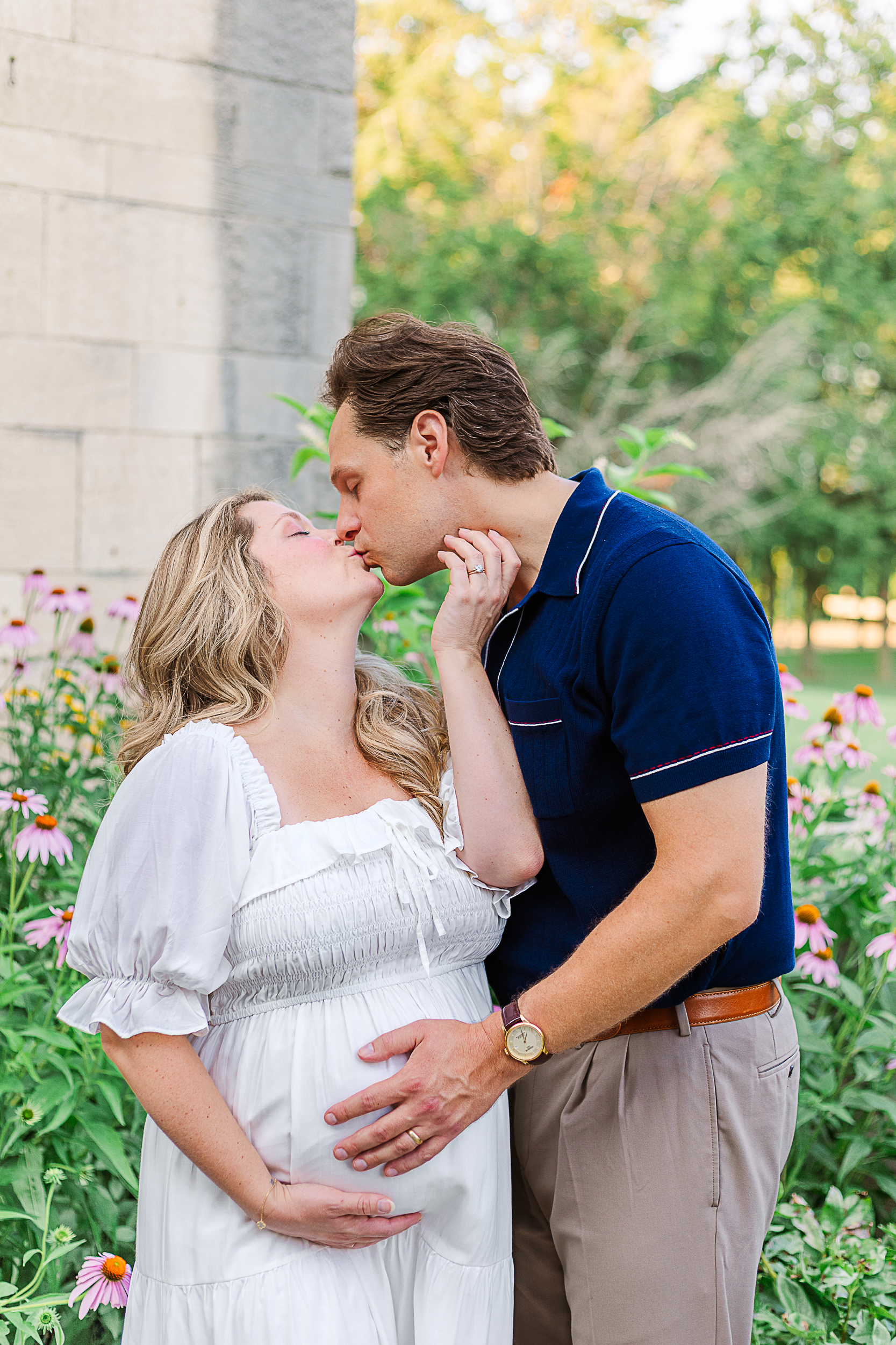 Mom and dad are sharing a kiss during their maternity session in Pittsburgh. 
